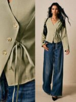 ⁦قميص نسائي أنيق بأزرار غير متماثلة وربطة خضراء⁩ - الصورة ⁦2⁩