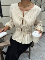 ⁦بلوزة نسائية بياقة مستديرة مع ربطة أمامية⁩ - الصورة ⁦13⁩