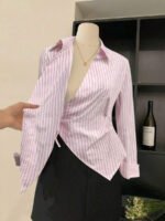 ⁦بلوزة نسائية مخططة بأكمام طويلة⁩ - الصورة ⁦11⁩